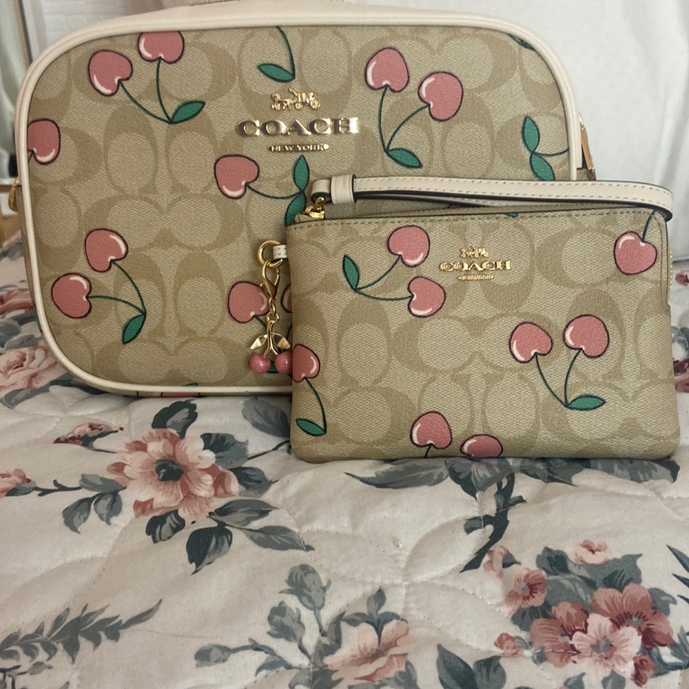Coach Jamie camera bag with cherry heart print and wrislet